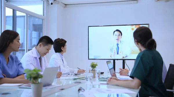 Medical concept. The medical team is communicating with the video call. Within the meeting room of the hospital. 4k Resolution.