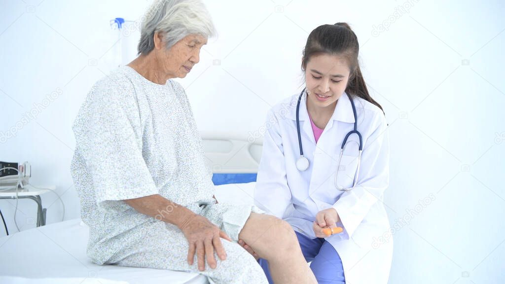 Medical concepts. The doctor is checking the patient's knee osteoarthritis in the hospital. 4k Resolution.