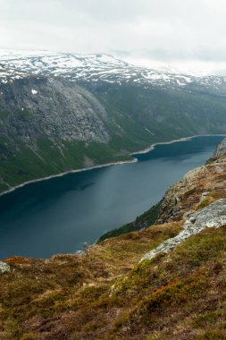 mountains and pond in Norway clipart