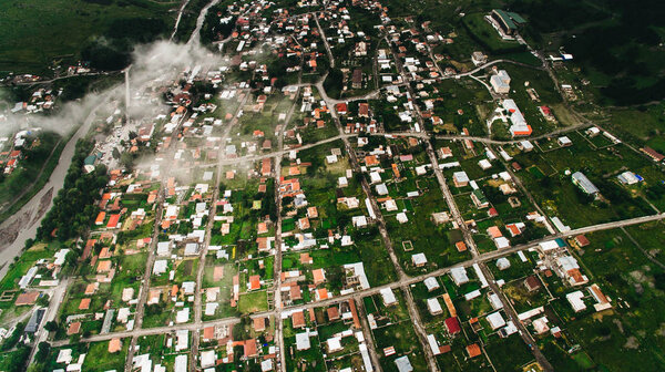 city in green mountains