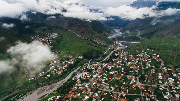 aerial view of city in mountains