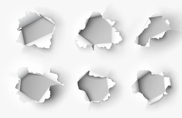 Set of Holes torn in paper — Stock Vector