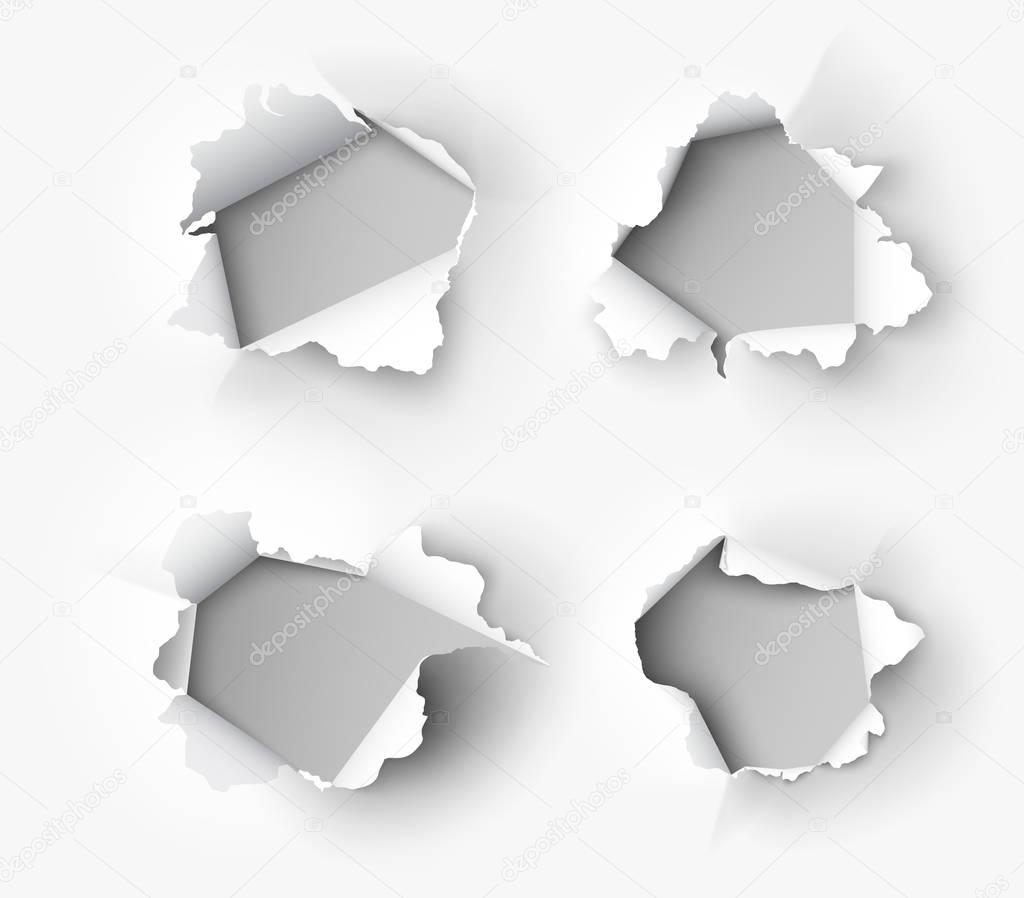 set of Holes torn in paper