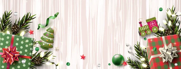 En-tête de Noël avec décorations traditionnelles, coffrets cadeaux et jouets en bois — Image vectorielle