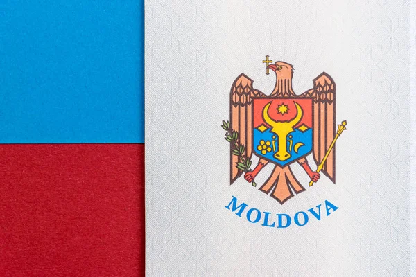 Republiek Moldavië Concept Het Moldavische Paspoort Een Blauwe Rode Achtergrond — Stockfoto