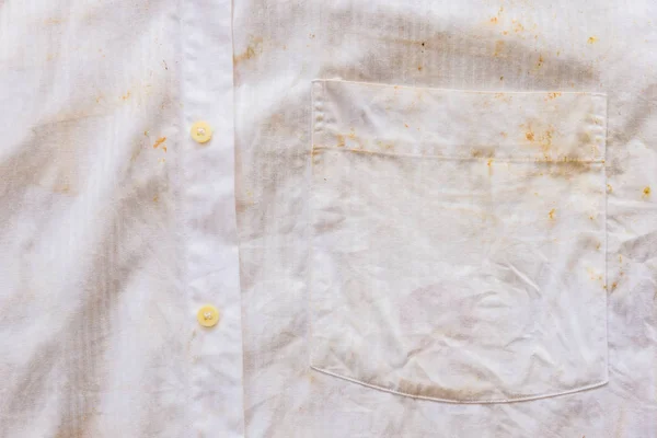 Närbild smutsiga vit skjorta ficka — Stockfoto