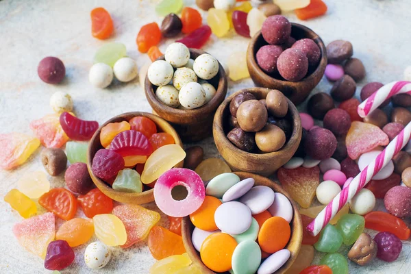 Colorful bright assorted sweets and candy for kids party on white table — Stock Photo, Image