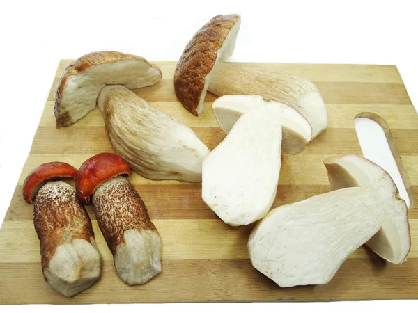 Fresh mushrooms on cutting board — Stock Photo, Image