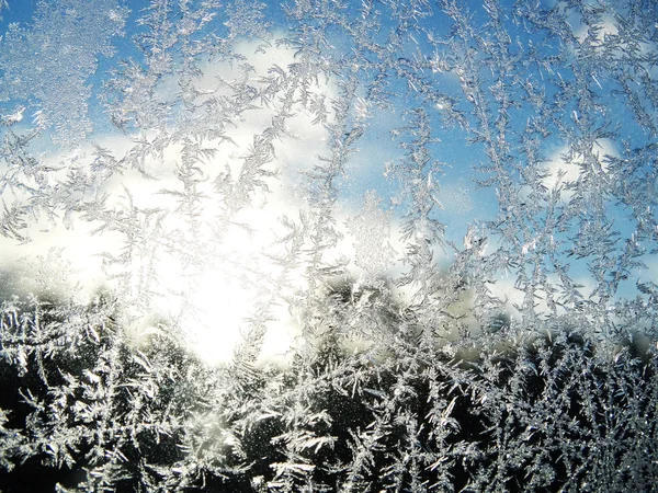 Płatki śniegu na szkle jako zimowe tekstura tło — Zdjęcie stockowe