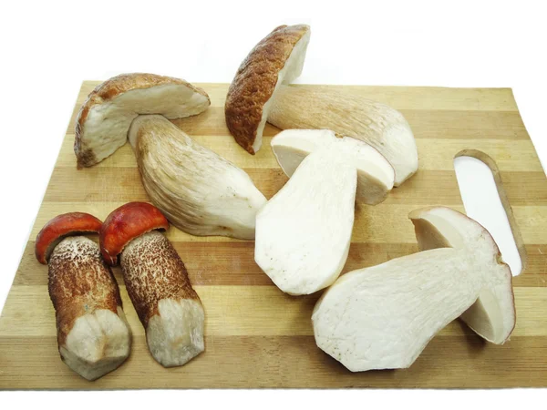 Fresh mushrooms on cutting board — Stock Photo, Image