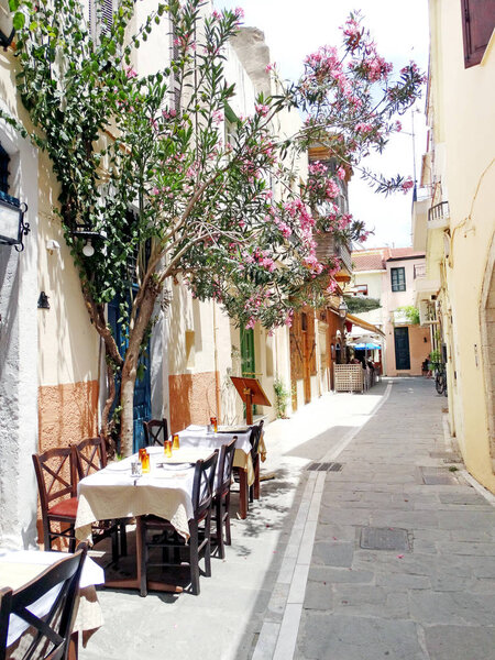traditional street amoung bougainvillaea in Greece 