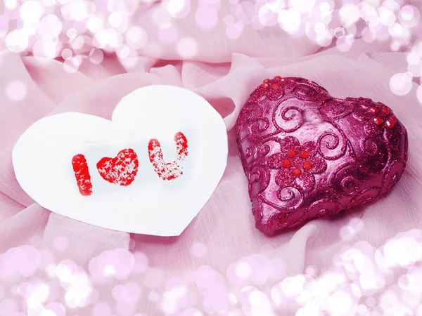 Red satin material with heart shape love concept — Stock Photo, Image