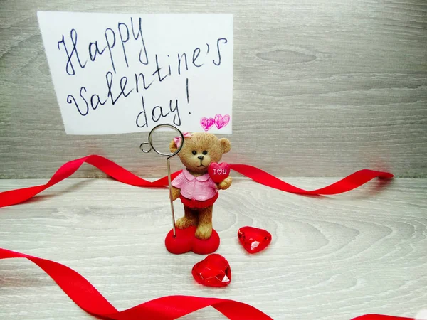 Valentine's day composition of gift box teddy bear and hearts — Stock Photo, Image