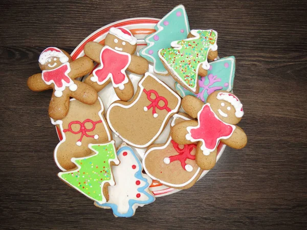 christmas cookies gingerbread and decoration on wooden backgroun