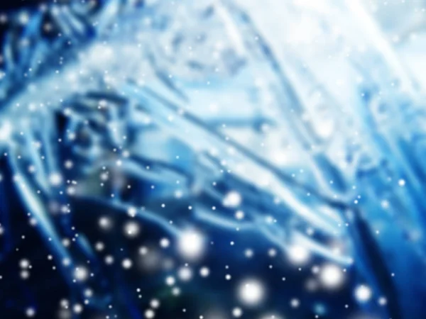 Weihnachtsbeleuchtung Hintergrund mit Schnee und Schneeflocken — Stockfoto