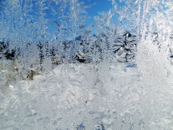 Sneeuwvlokken patroon als achtergrond van de textuur van de winter — Stockfoto