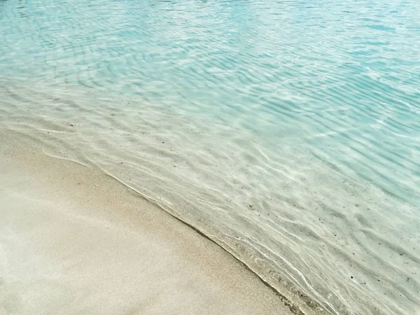 Vatten konsistens sand beach sommaren semester bakgrund — Stockfoto