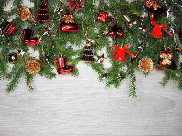 Christmas decoration and snow on wooden background — Stock Photo, Image