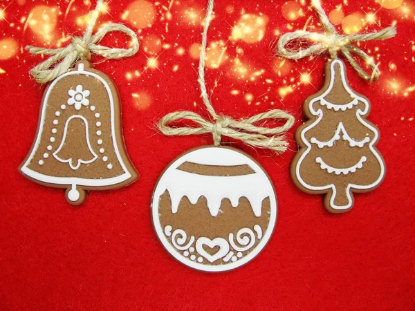 Christmas cookies gingerbread and decoration on red background — Stock Photo, Image