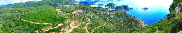 Panorama paleokastritsa lagunas azuis costa paisagem mar ionian — Fotografia de Stock