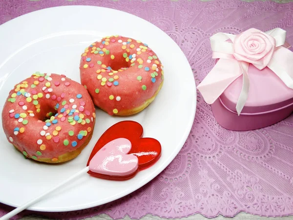 Valentine's day chocolate donuts heart lollipop and gift box — Stock Photo, Image