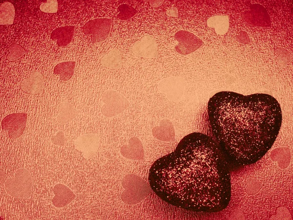 Alla hjärtans dag love holiday concept hjärtan på glänsande röda backgro — Stockfoto