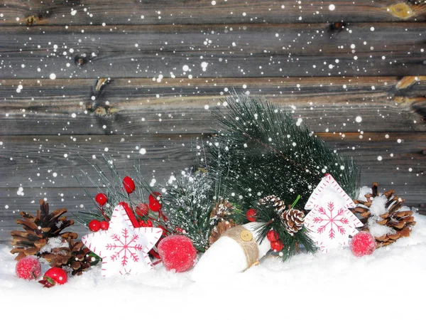 Christmas decoration winter berries and snow on wooden backgroun Stock Photo
