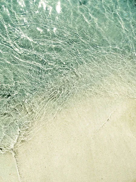 Vatten konsistens sand beach sommaren semester bakgrund — Stockfoto