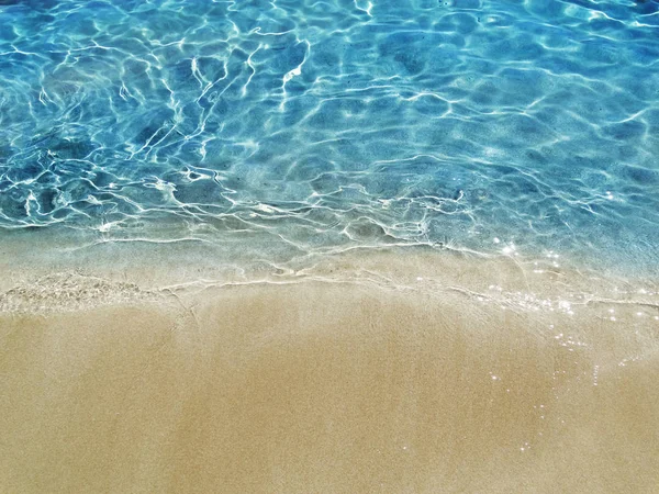 Textura del agua arena playa verano vacaciones fondo —  Fotos de Stock