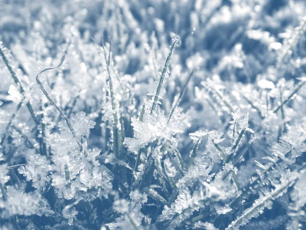 雪の結晶模様と雪の冬の背景 — ストック写真