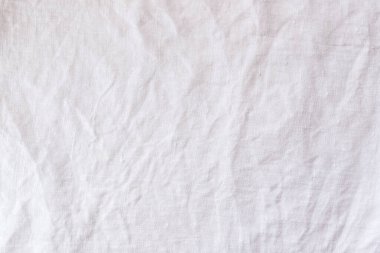 Beyaz buruşuk keten kumaş dokusu arkaplanı.