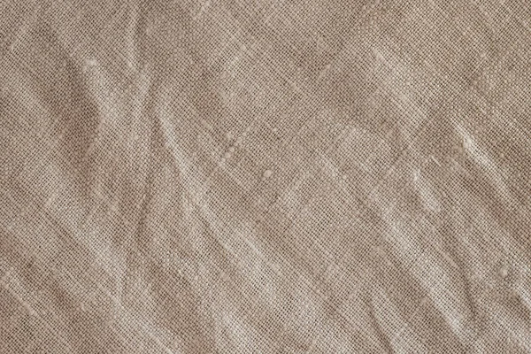 粗糙皱皱的褐色亚麻布背景质感闭合正面视图 — 图库照片