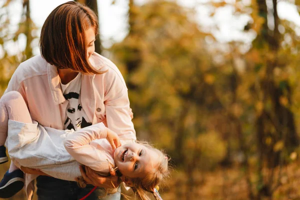 Young Mother Playing Little Daughter Holding Her Arms — Stock Photo, Image