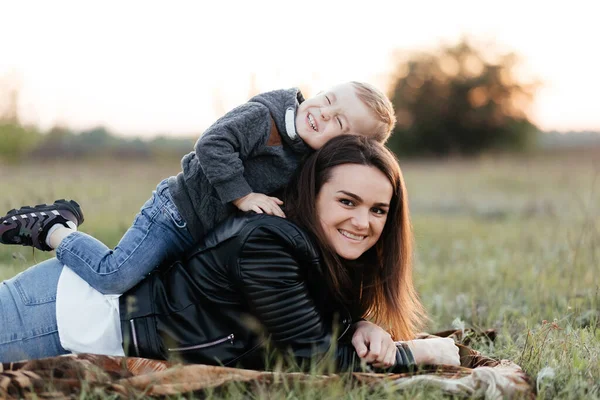Mother Her Little Son Lying Grass Smiling Mother Son Portrait — Stock Photo, Image