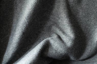 kıvrımlı gri kumaş