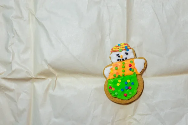 Gingerbread for new years and Christmas on craft paper backgroun — Stok Foto