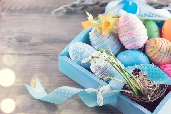 Easter Colorful Painted Eggs Spring Flowers Blue Satin Ribbon Wooden — Stock Photo, Image