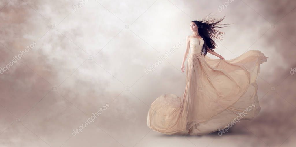 model in luxury beige flowing chiffon dress