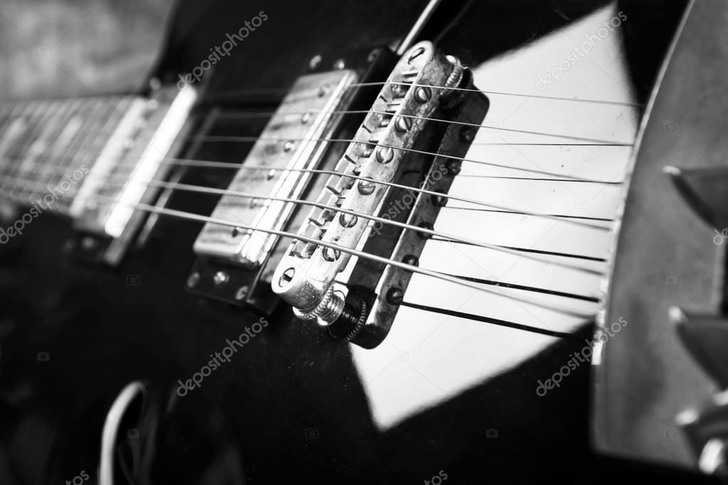 Acoustic guitar in dark background