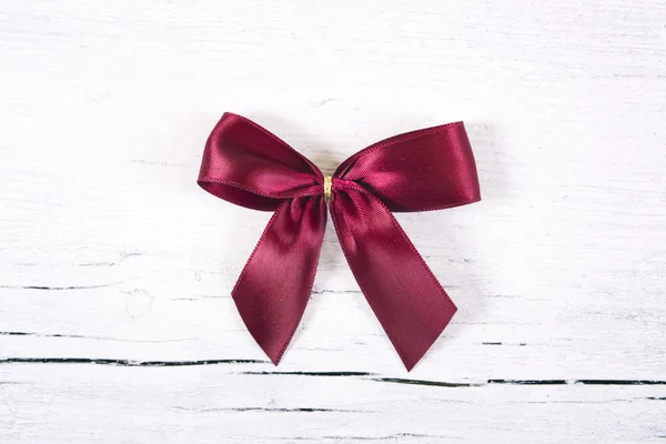 Brilliant red bow - a Christmas ornament. — Stock Photo, Image