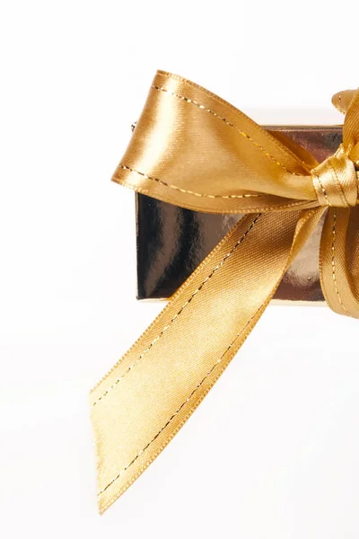 Gold bow isolated on a white background — Stock Photo, Image