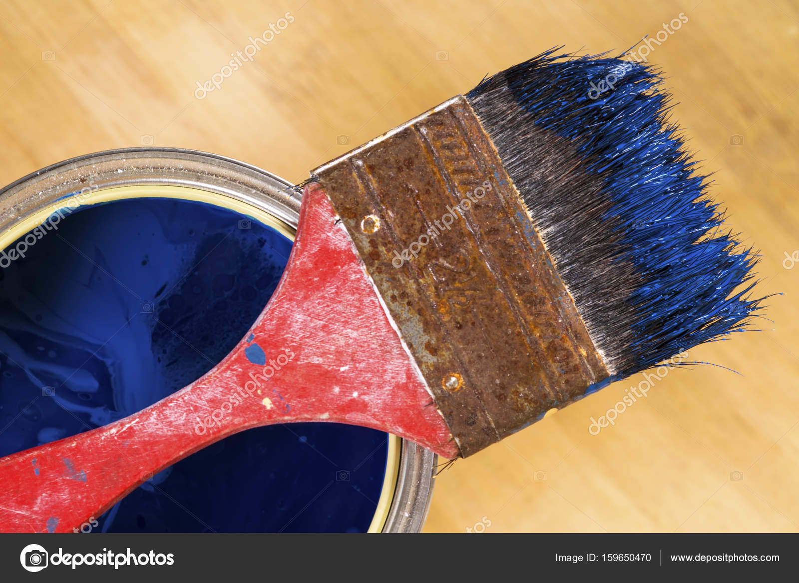 Full of blue paint tin and paint brush on it — Stock Photo © Katrin