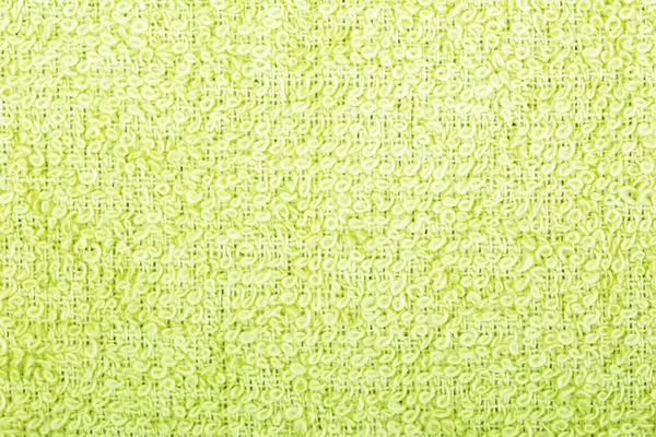Green cotton fabric texture background.