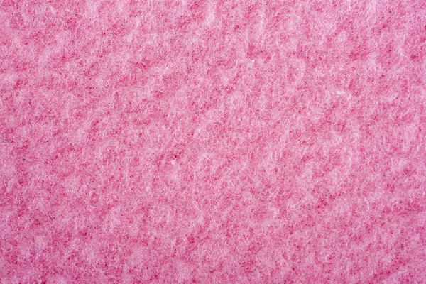 Close-up roze stof textuur achtergrond. — Stockfoto