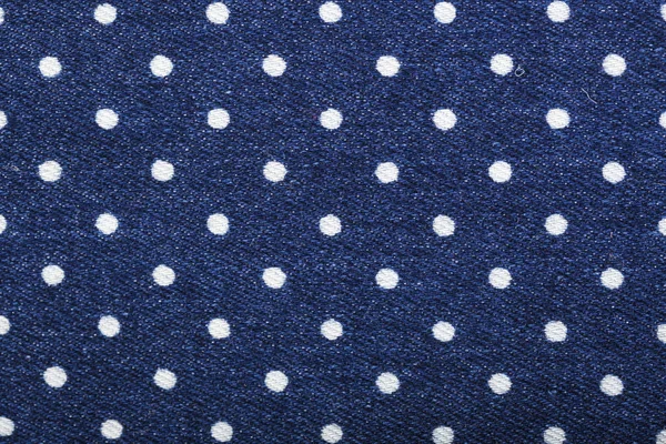 Stampa timbro piselli su tessuto jeans blu denim — Foto Stock