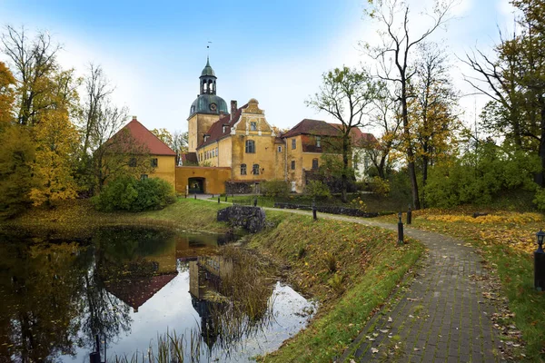 Latvian farmhouse with  garden lake Stock Photo