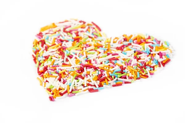 Confetti di pasticceria di sfondo pasquale. Cuore . — Foto Stock