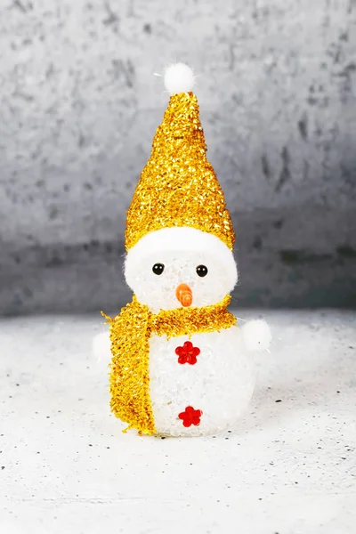Muñeco de nieve con sombrero y bufanda —  Fotos de Stock