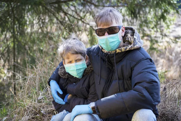 Boys in protective sterile medical mask.Air pollution, virus, Chinese pandemic coronavirus concept.