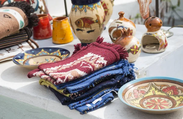 Ceramic and textile products in the souvenir shop in Greece